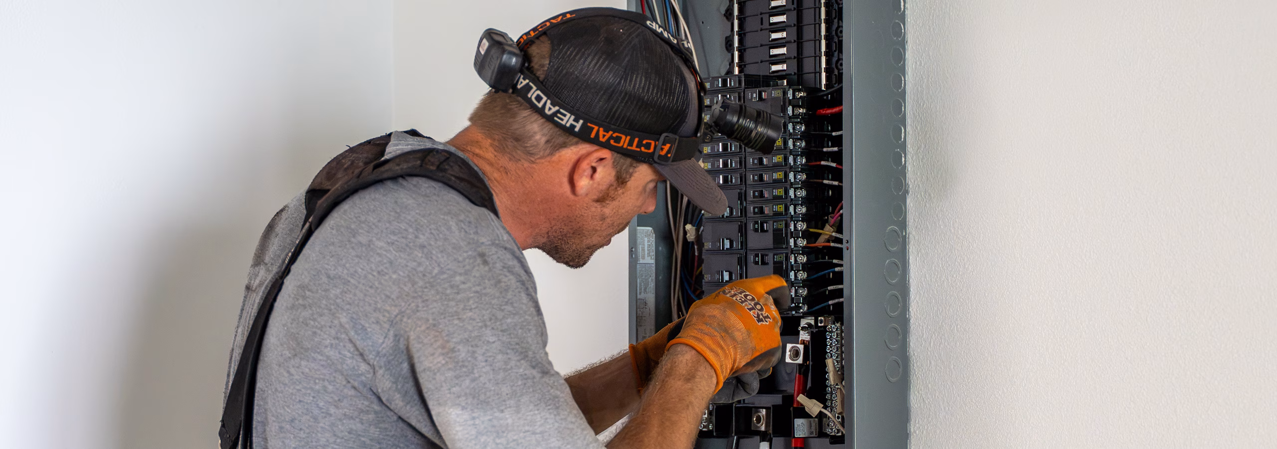 G5 Electric electrician working on a commercial electrical panel.